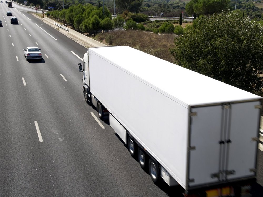 White box truck on the highway