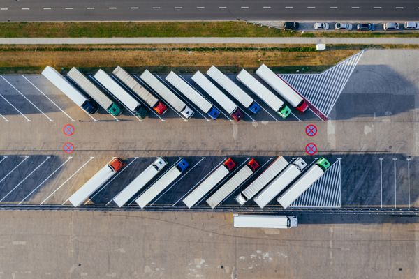 Aerial view of semi-trailers parked in a fleet lot